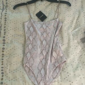 Snake skin print body suit